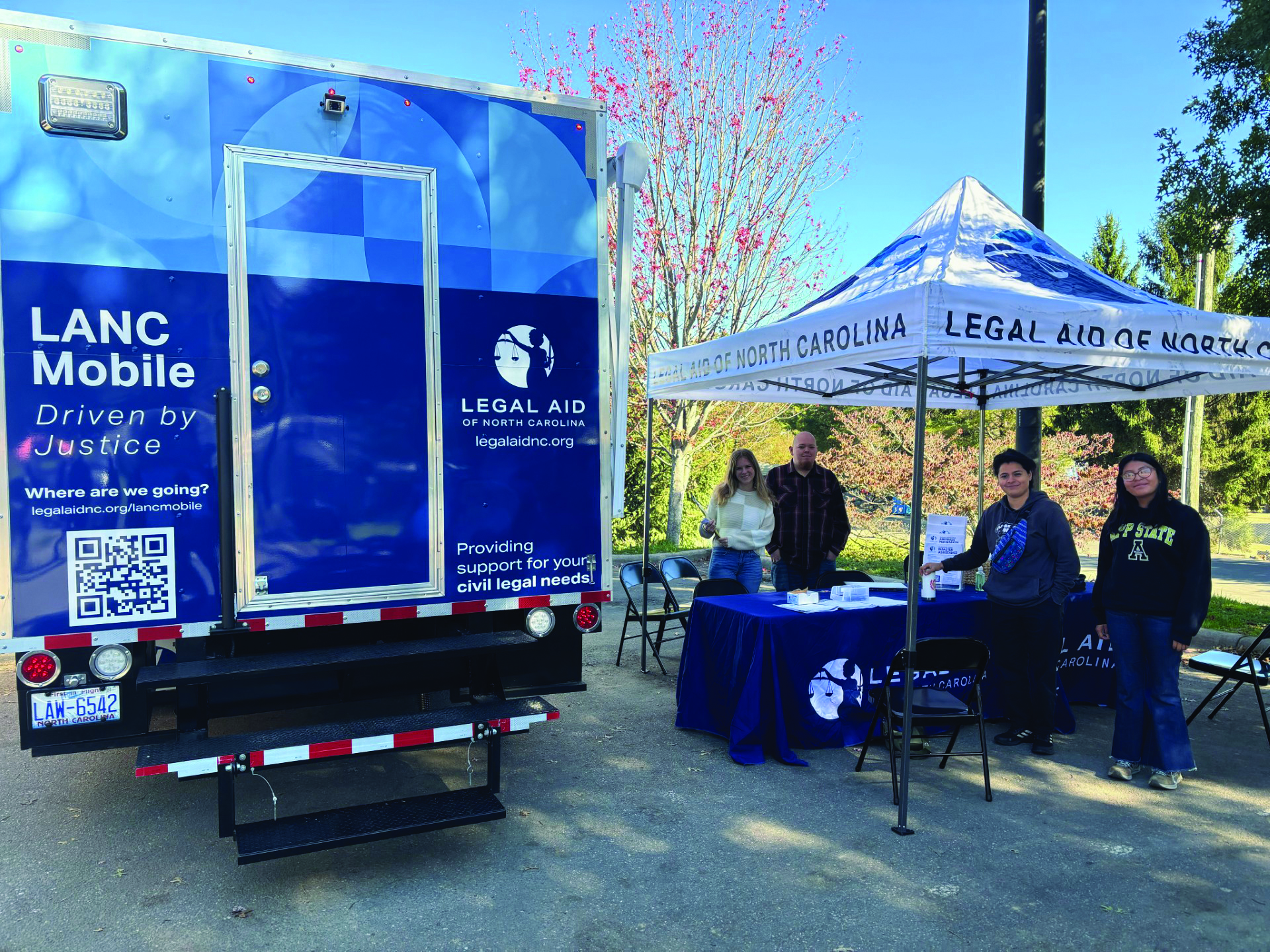 Disaster relief 2 Legal Aid of North Carolina staff provide information and brief advice to victims in Boone during an outreach event. The LANCMobile, a mobile services intake unit, allows for easier access in disaster-stricken areas.